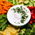 Homemade Ranch Dip served with fresh vegetables and chips.