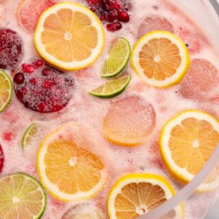 Sparkling Berry Punch is fresh, delicious and perfect for any spring party. Made with cranberry juicy, lemon juicy, sherbert and a little sugar with a beautiful pick color.